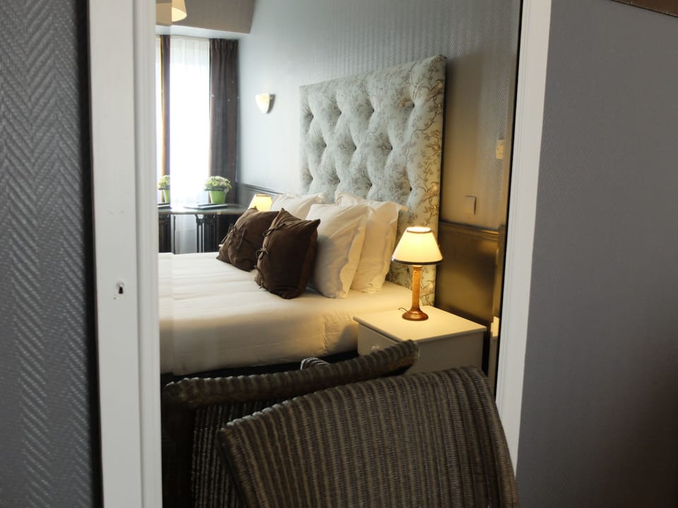 Premium bedding, blackout drapes, free WiFi, bed sheets