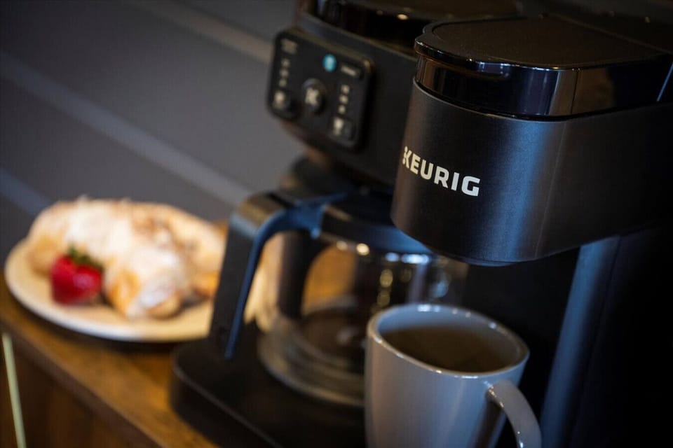 Start your mornings right with fresh coffee from the Keurig—because every day at Grand Highland should begin with comfort.
