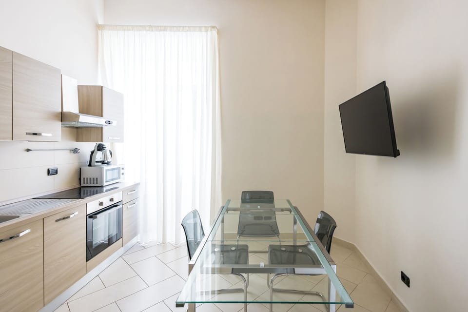 Comfort Apartment | Living area | 50-inch LED TV with digital channels