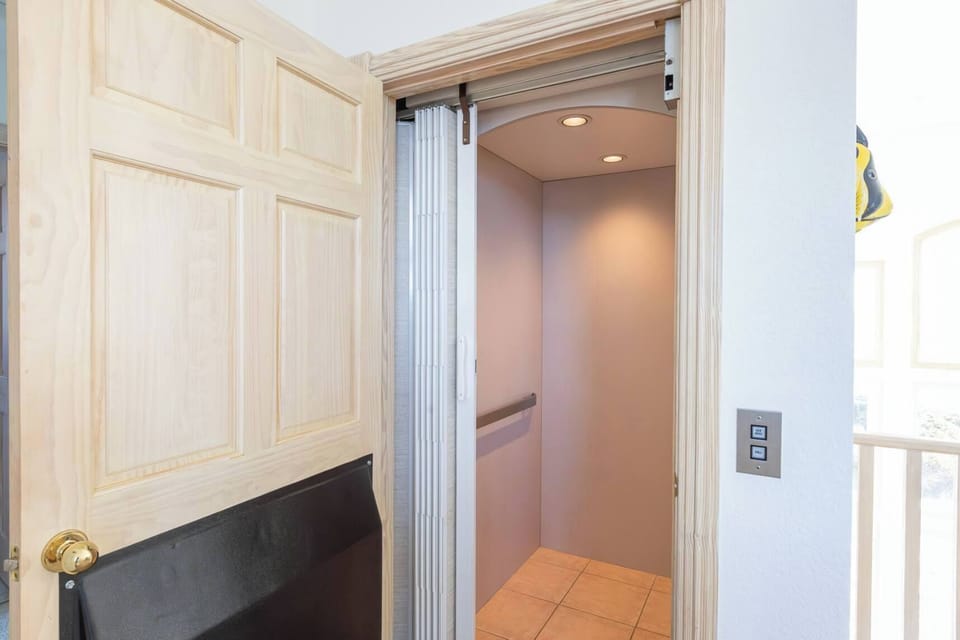 Private Elevator: Convenient access to all three levels including the ground-floor entry