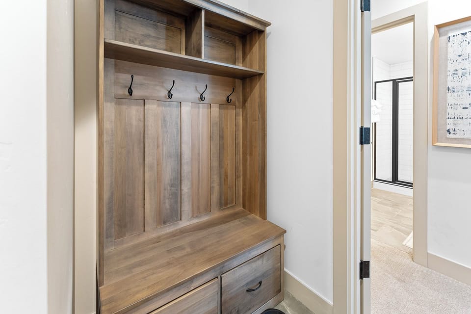 Gear removal area just outside of the garage entrance and first floor bedroom.