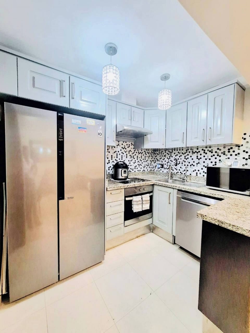 Deluxe Condo, 2 Bedrooms, Golf View | Private kitchen | Full-size fridge, microwave, oven, stovetop