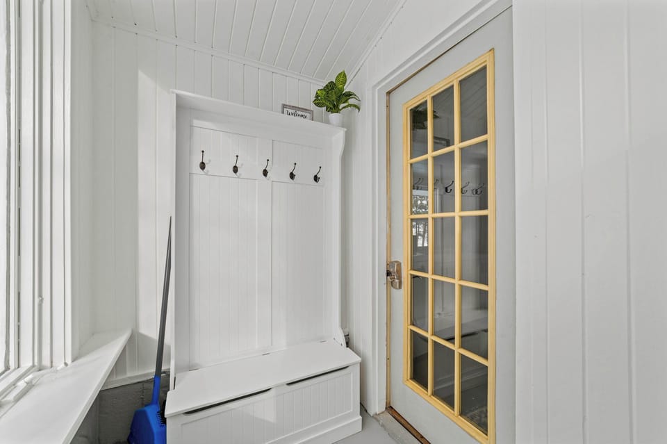 Entryway with plenty of room for coats and boots