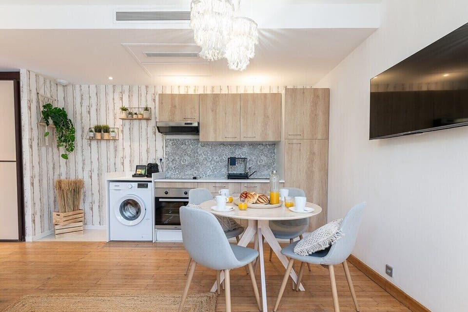 Luxury Apartment, Ensuite (Bord De Plage) | Shared kitchen | Full-size fridge, espresso maker, coffee/tea maker, electric kettle