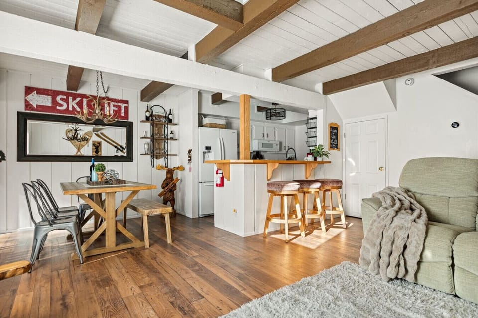 Multiple seating options in the open concept kitchen and dining room space.