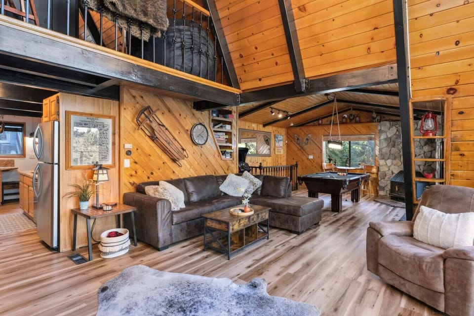 A large, comfortable sectional is featured in the living room space.
