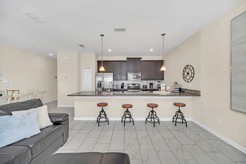 Spacious kitchen with modern appliances.
