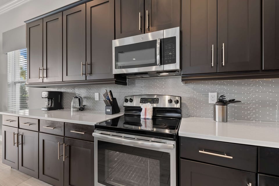 Stainless steel appliances throughout this large kitchen