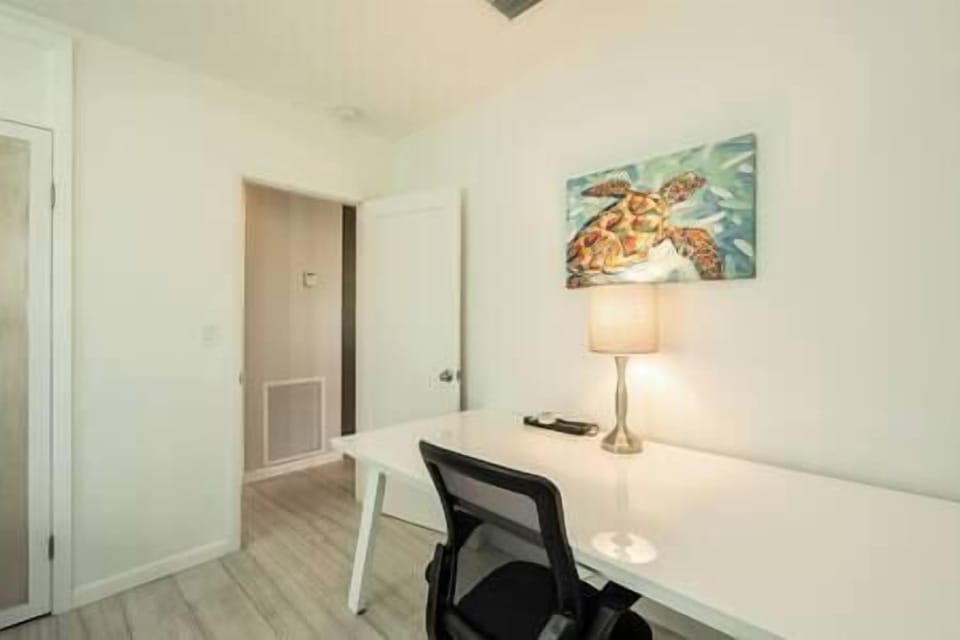 This drafting desk is clean and generously sized for creativity and working remotely. 