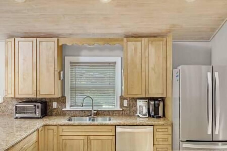 Large kitchen with stainless steal appliances