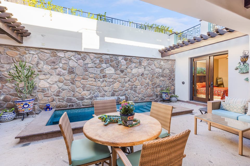 Dinning Room 4 seaters with view to heated pool.
