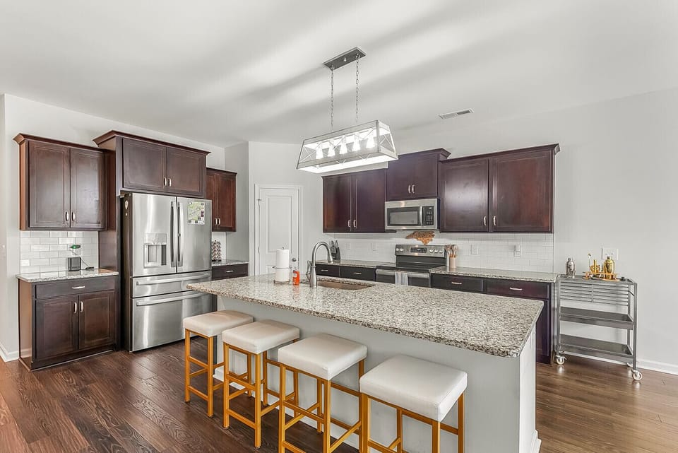 Spacious kitchen with breakfast bar seating