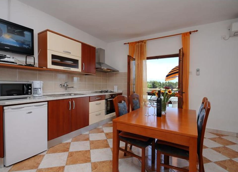 Apartment (One Bedroom Apartment with Balcony an) | Private kitchen | Fridge