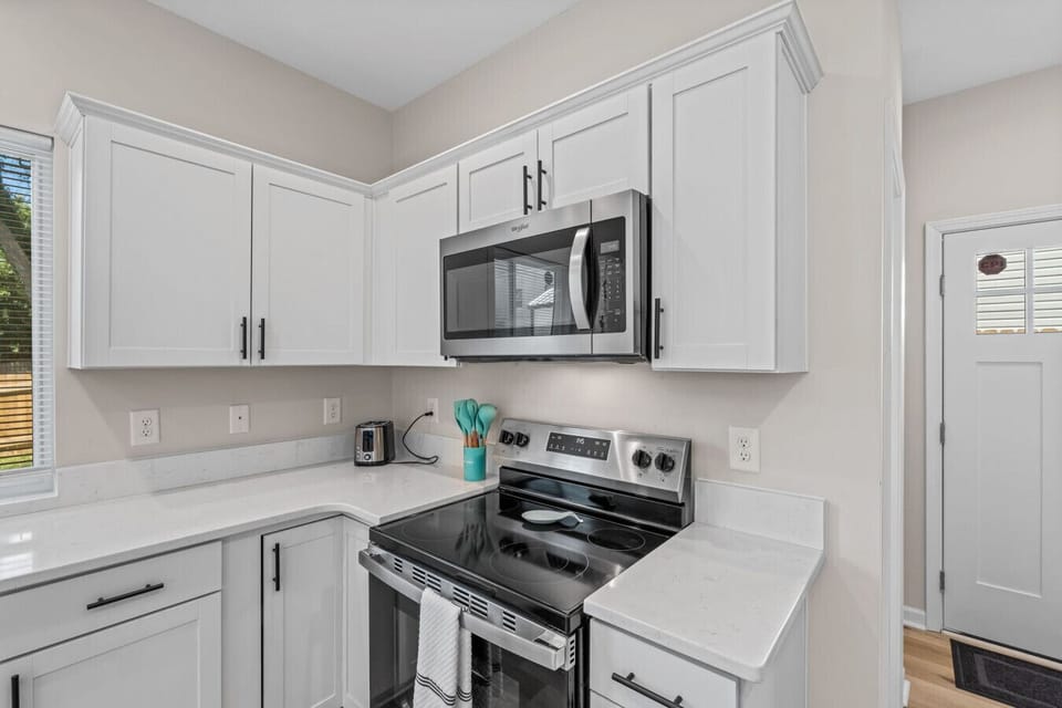 Large kitchen that is perfect for gathering and/or cooking a large meal.