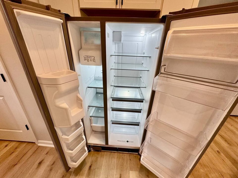 Brand new fridge/freezer with ice maker and water dispenser.
