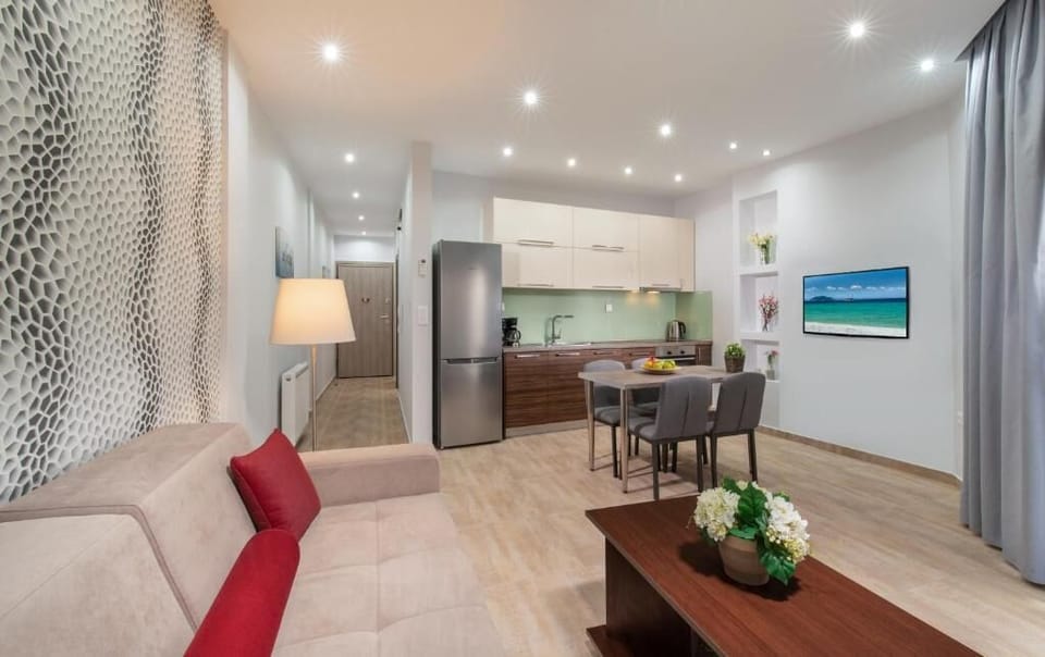 Deluxe Apartment, City View | Living area | 30-inch flat-screen TV with digital channels