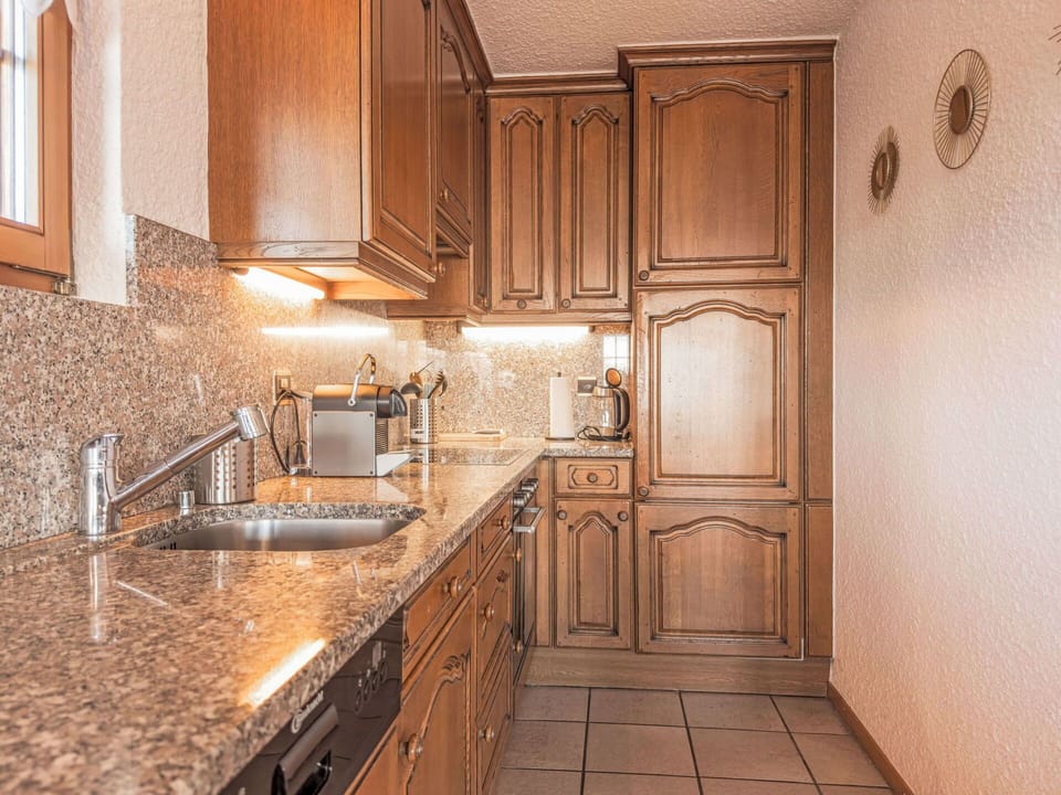 Kitchen, Countertop, Kitchen Appliance, Cabinetry, Major Appliance, Interior Design, Flooring, Kitchen Sink, Sink, Stove