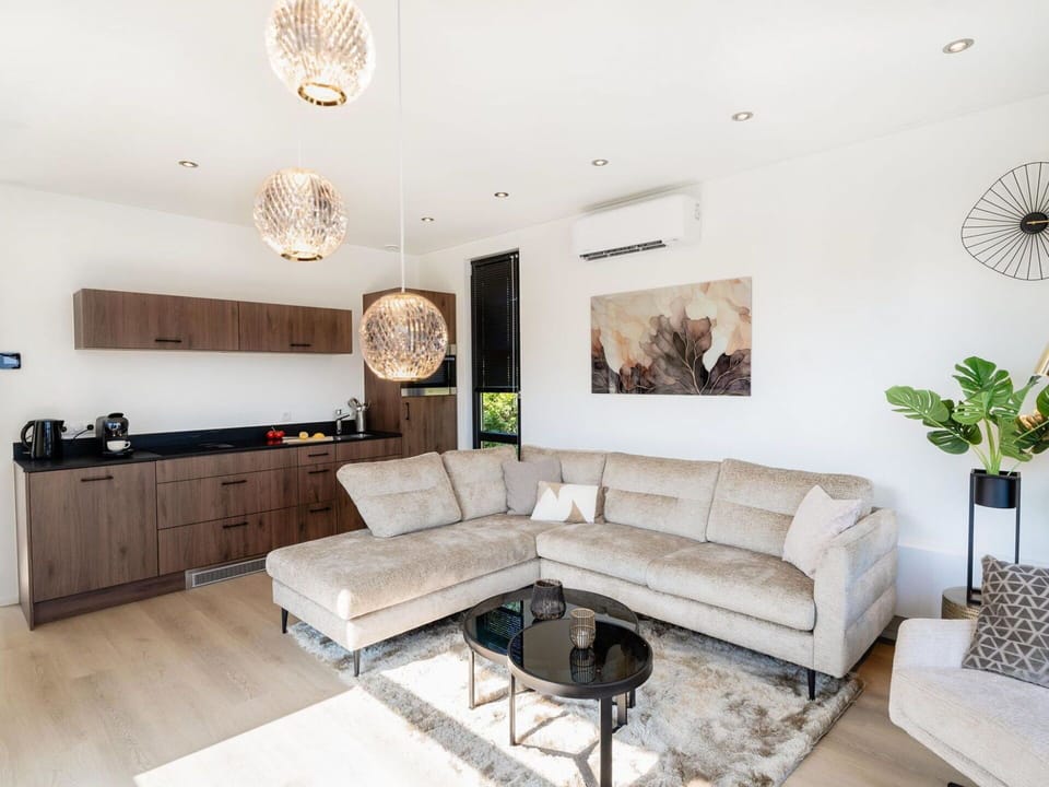Furniture, Interior Design, Flooring, Couch, Floor, Wood, Living Room, Ceiling, Home, Wood Flooring