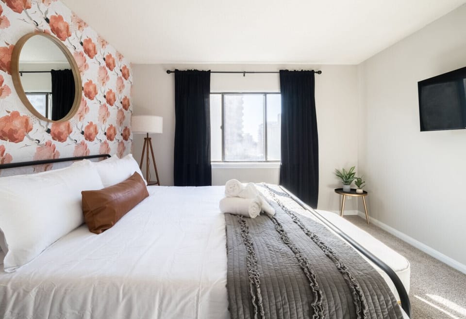 Relax with a 40` smart tv in each bedroom. This bedroom has a plush King bed you can curl up in after a long day of sight seeing.