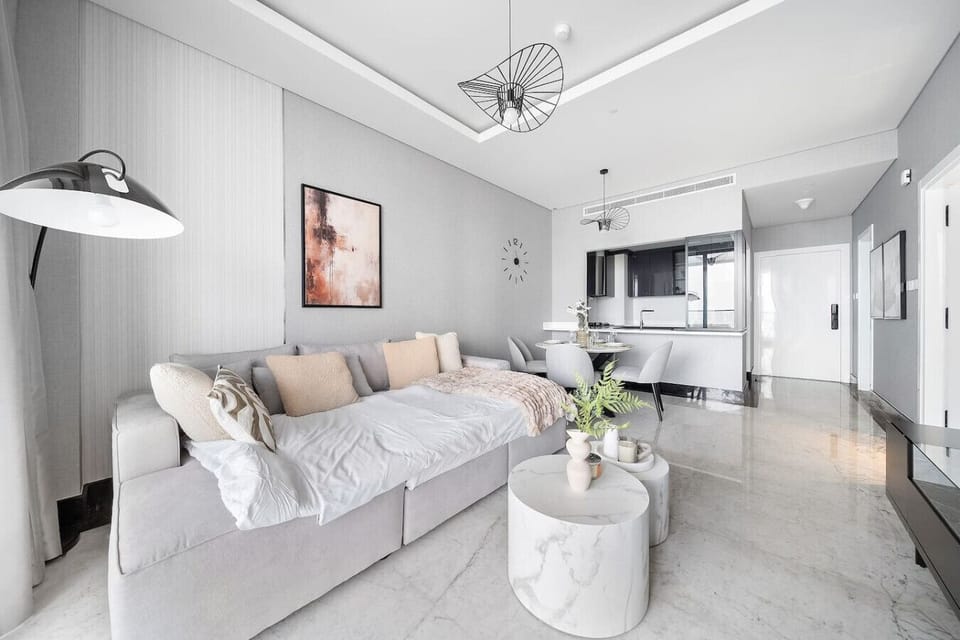 Living Room: Chic modern design with plush seating and bright, airy ambiance. Perfect for unwinding!
