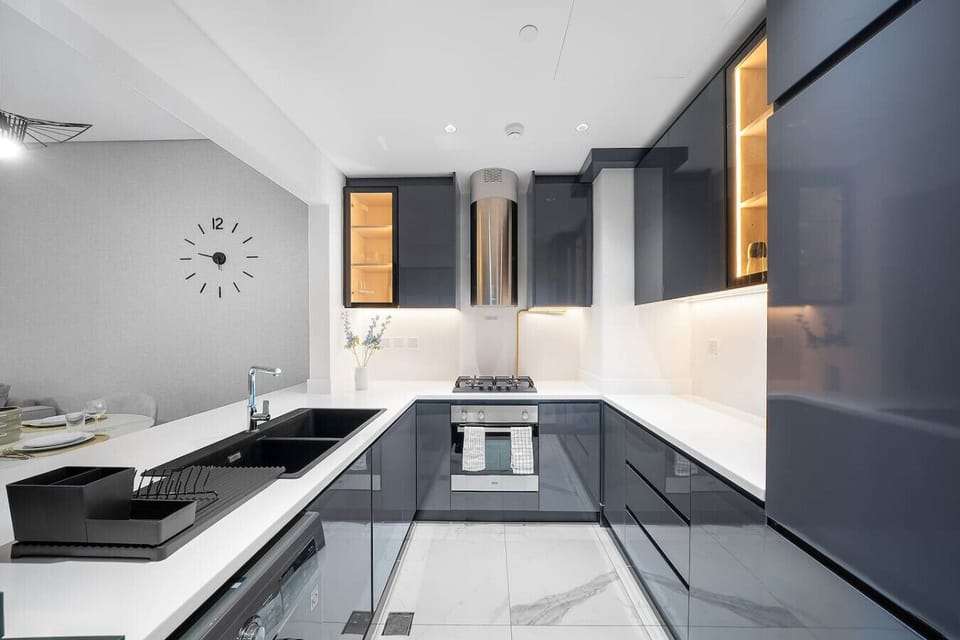 Modern Kitchen: Culinary adventures await in this sleek, stylish space with top-notch appliances!