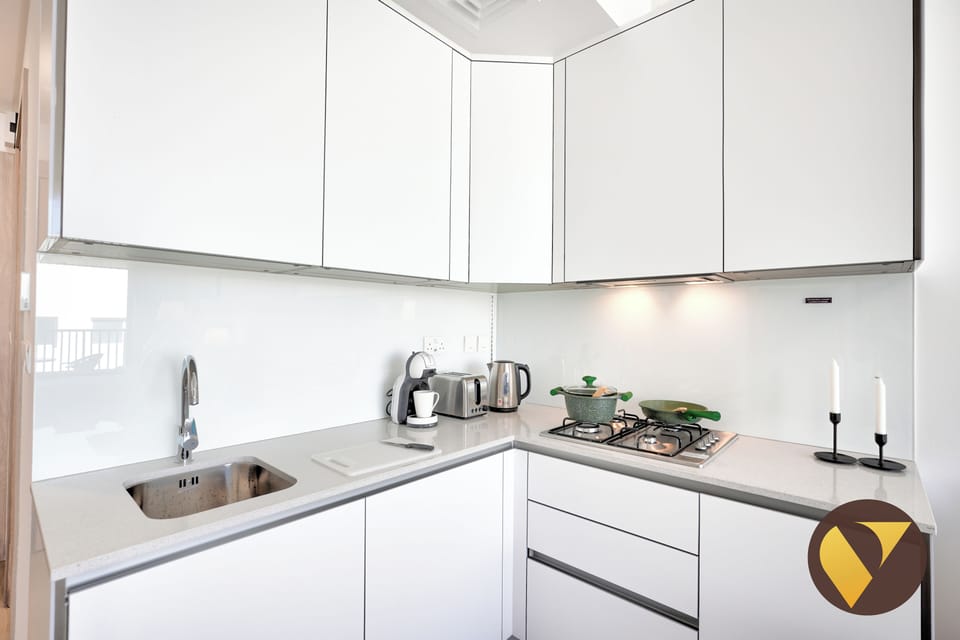 Luxury Studio, City View | Private kitchen | Full-size fridge, microwave, oven, stovetop