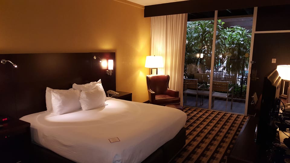 Hypo-allergenic bedding, desk, blackout drapes, iron/ironing board