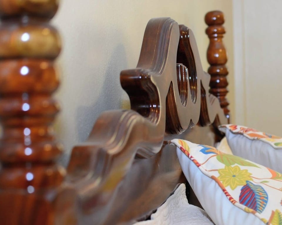 Locally crafted queen bed with elegant design and comfortable sleep.