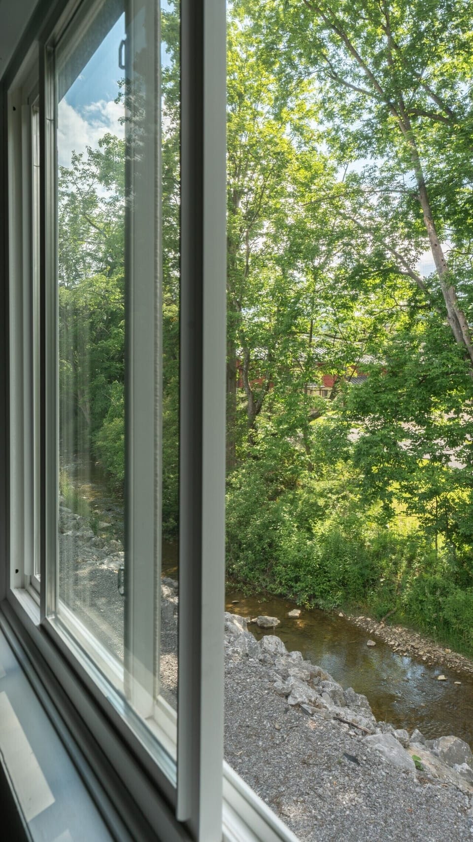 Windows open for a fresh breeze with added nature sounds from the creek