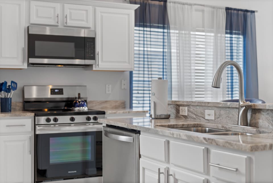 bright and open kitchen full stocked to cook meals
