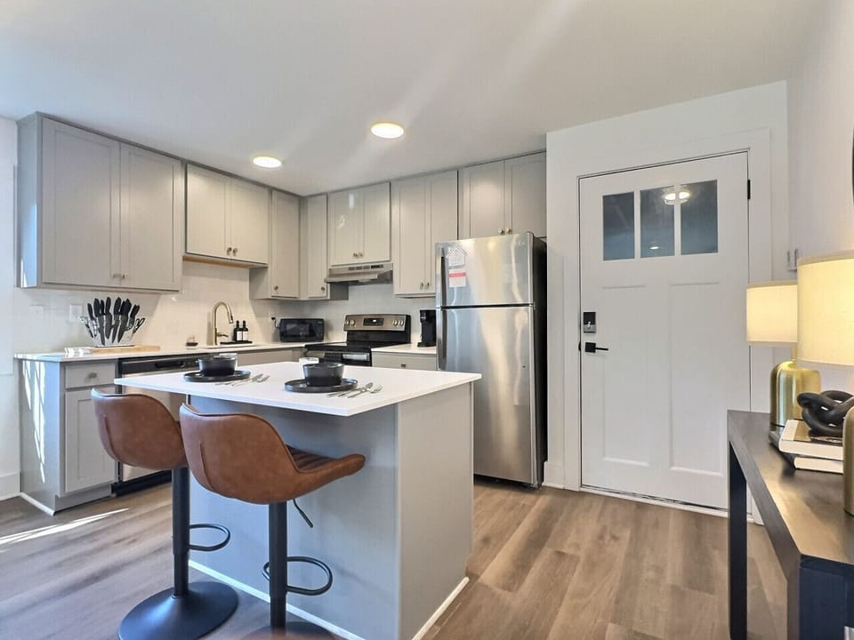 Cook, dine, and enjoy in this welcoming kitchen space, perfect for your short-term rental stay.