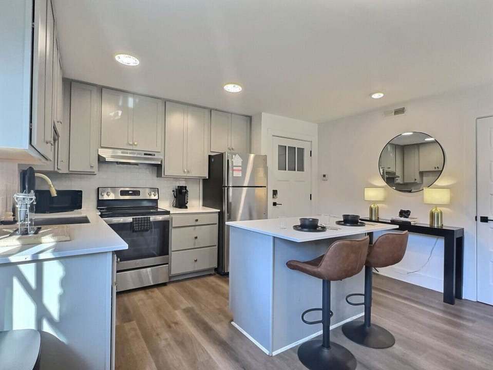 Cook, dine, and enjoy in this welcoming kitchen space, perfect for your short-term rental stay.