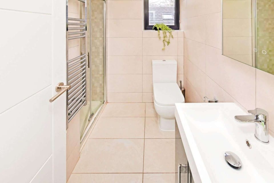 Spacious family bathroom with modern finishes, complimentary toiletries and everything you need for a comfortable and refreshing stay
