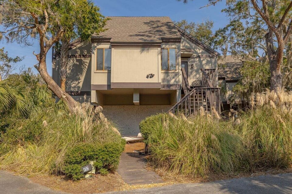 Exterior of property nestled among trees