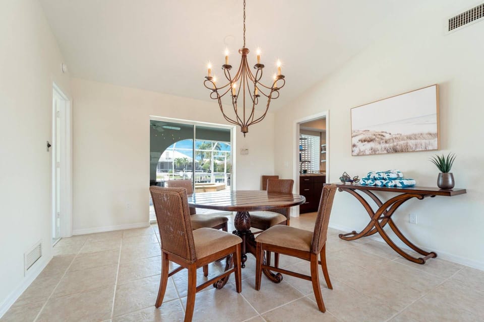 The dining nook is located adjacent to the kitchen.