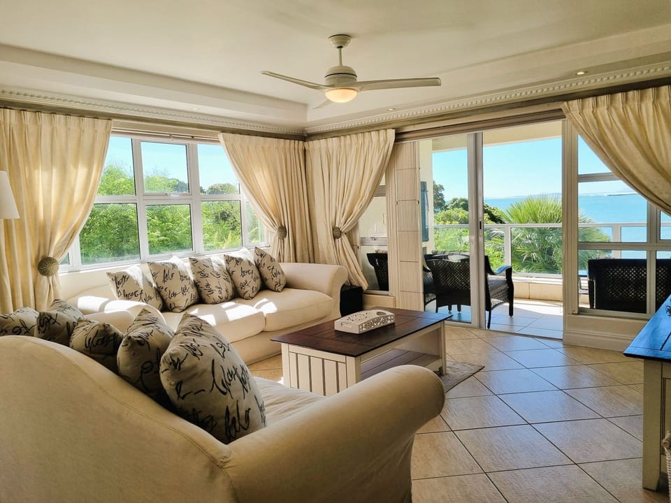 View of the lounge and the sliding doors leading out to the balcony
