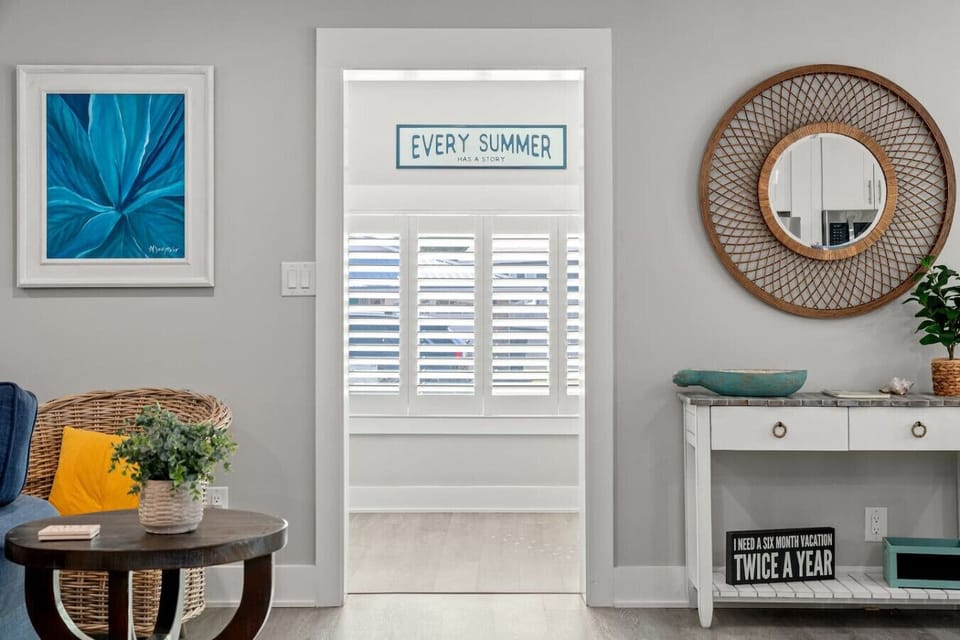 A welcoming entryway or hallway, featuring stylish decor and a smooth flow into the main living areas, setting the tone for the rest of the home.