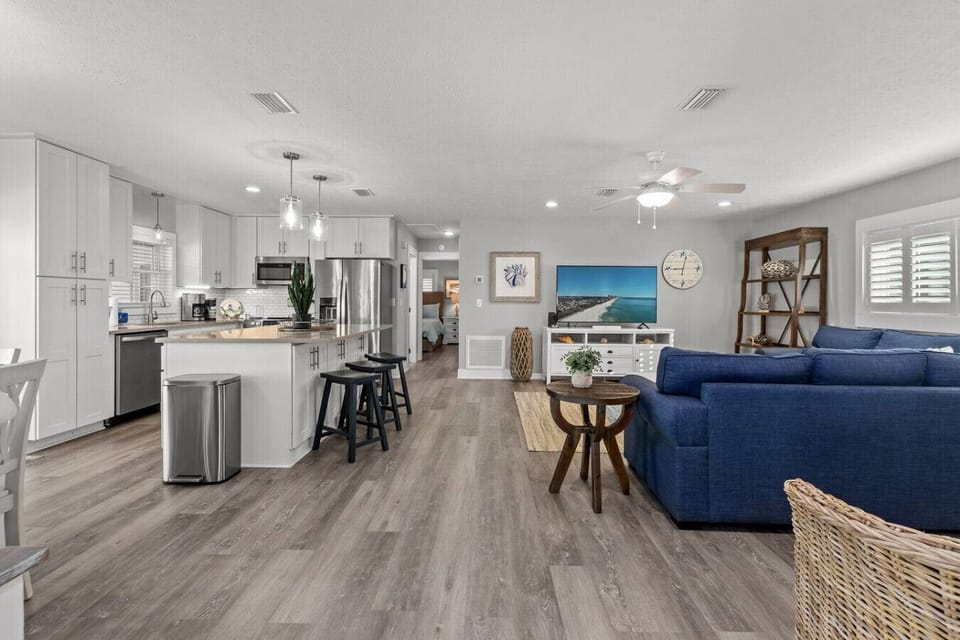 Open concept sleek kitchen and modern cozy living room!