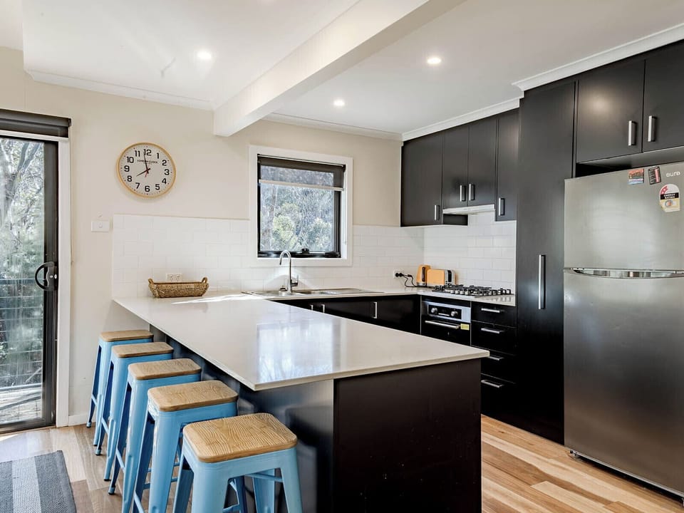 Deluxe 3 Bedroom Loft-Style Lodge | Private kitchen | Coffee/tea maker