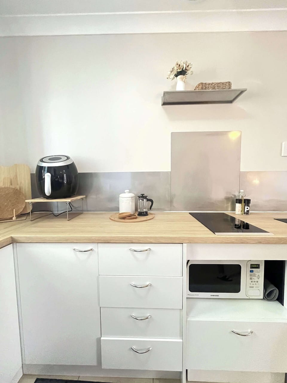 Modern appliances and ample counter space make meal prep simple and enjoyable.