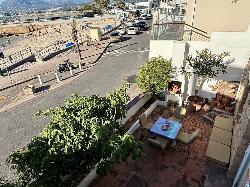 View of the downstairs braai area and road from the balcony