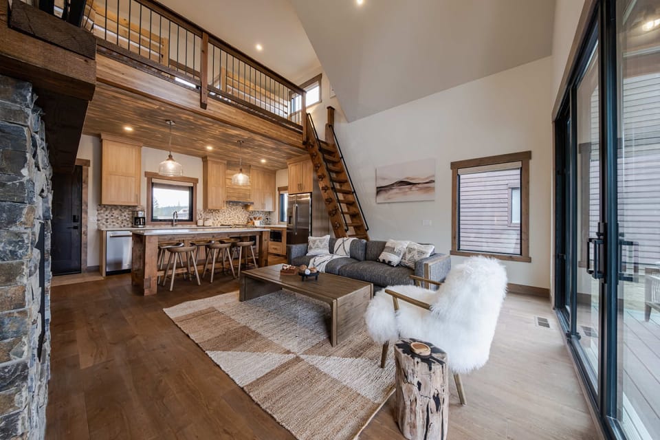 Curl up in the cozy living room & stream your favorites by the fireplace