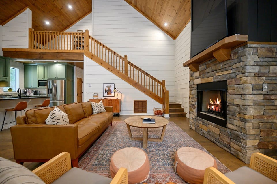 Stream your favorites by the fireplace in the open concept living room