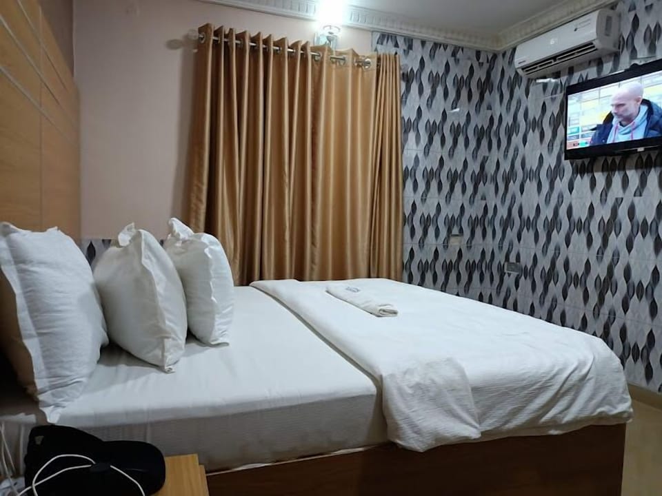 Deluxe Room, Balcony, City View | Desk, laptop workspace, free WiFi