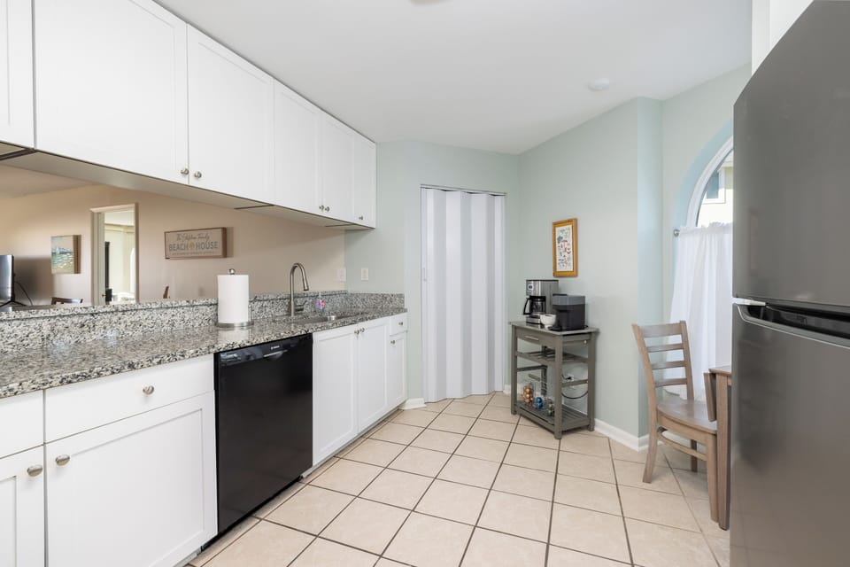 Coastal Kitchen with updated appliances and ample counter space