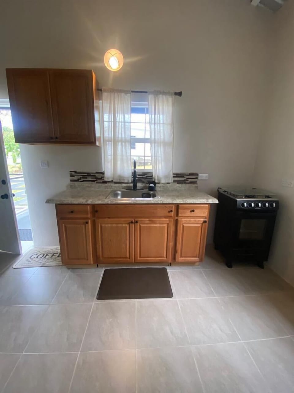 Comfort Apartment, Garden View | Private kitchen | Full-size fridge, oven, stovetop, electric kettle