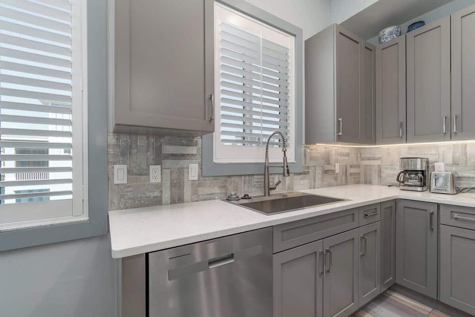 Open kitchen with plenty of counter space for cooking. Full pot drip coffee maker