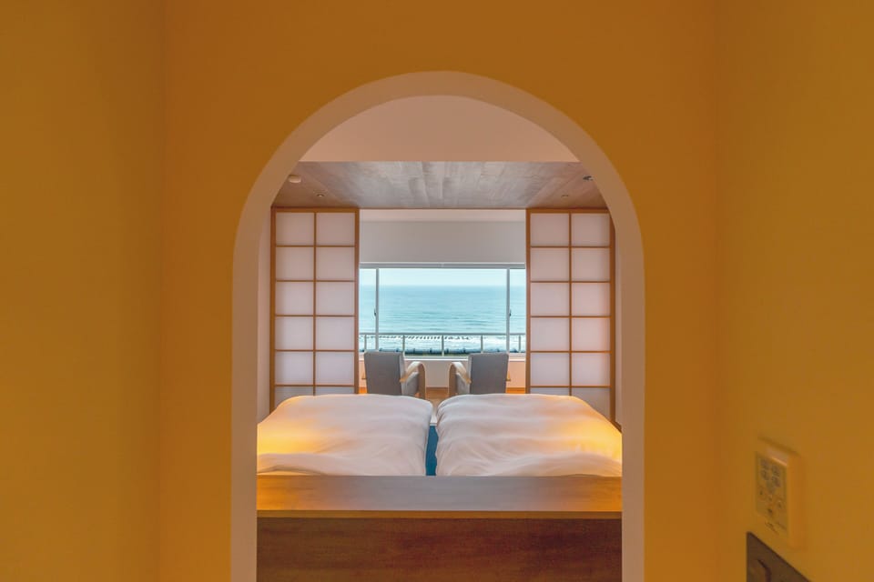 Design Twin Room, 2 Bedrooms, Non Smoking, Sea View | In-room safe, WiFi (free), bed sheets