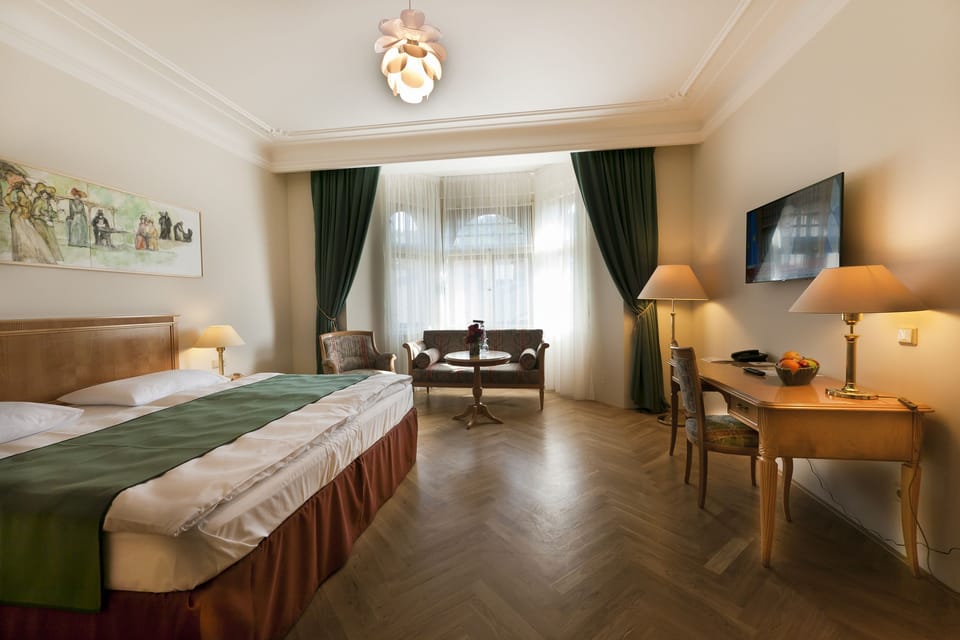 Superior Double Room | Minibar, in-room safe, desk, iron/ironing board