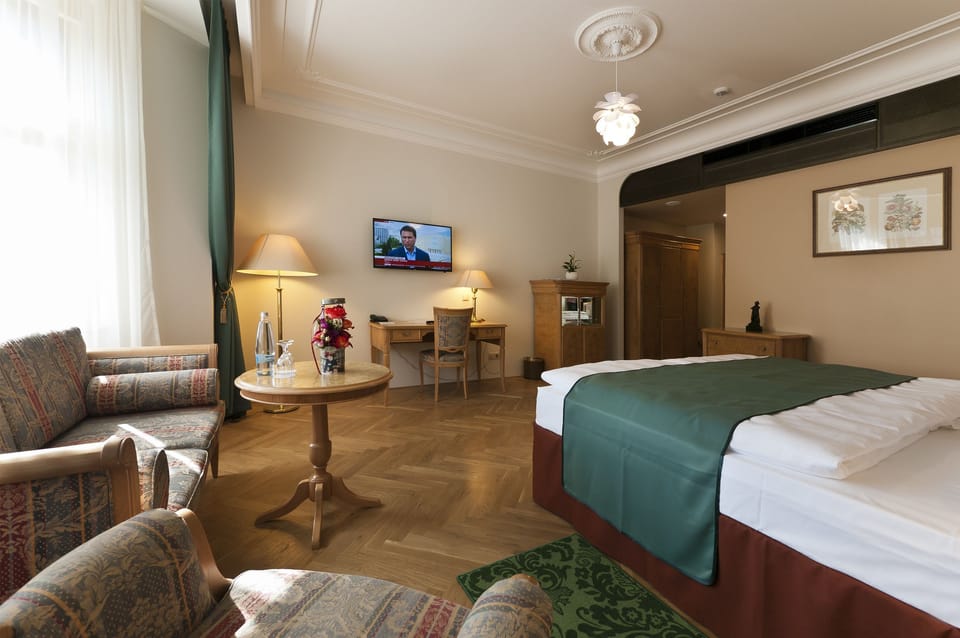 Superior Double Room | Minibar, in-room safe, desk, iron/ironing board